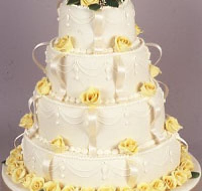 torta nuziale con decorazioni gialle